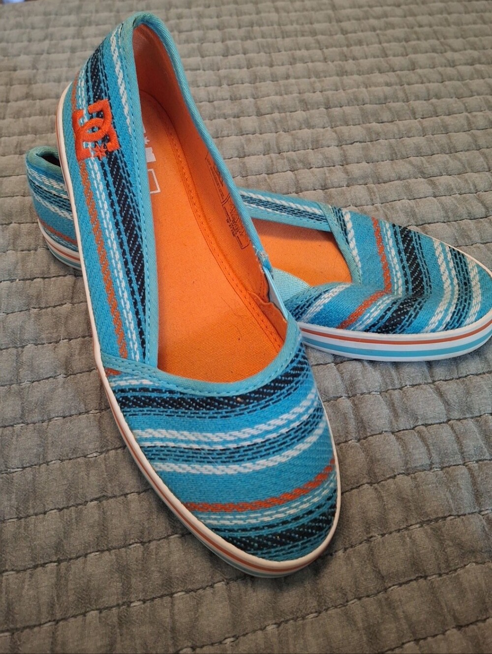DC Slip-On Sneakers in Turquoise & Orange Stripes